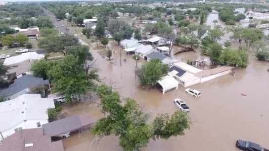 Houses flooded by the Concho River in San Angelo, Texas