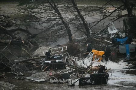  Broken trees and overturned vehicles after the Guadalupe River flash flood in Kerrville, Texas. 